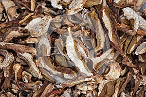 Heap of dried edible mushrooms on the market