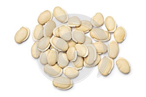 Heap of dried lablab beans close up on white background photo