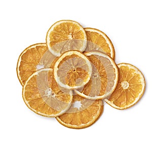 Heap of dried orange slices isolated on white background