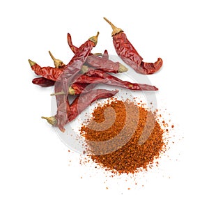 Heap of dried red chili peppers and chili powder