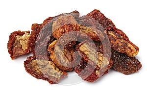 Heap of dried tomatoes on white background close up