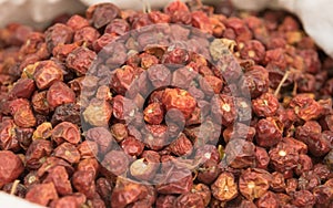 Heap of Dried whole round Chillis (Dundicut). photo
