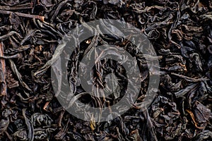 Heap of dry black tea texture macro
