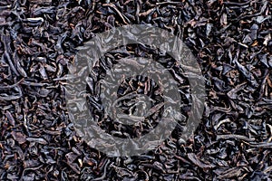 Heap of dry black tea texture macro