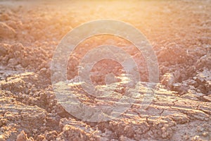 Heap of dry soil and rough mud in construction site