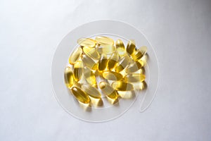 Heap of evening primrose oil supplement capsules