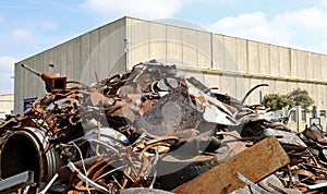 Heap of ferrous materials in the metal recycling plant. photo