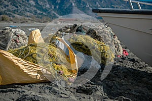 Heap of fishing nets on the beach