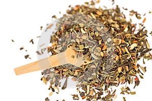 Heap of floral loose leaf herbal tea blend isolated on a white