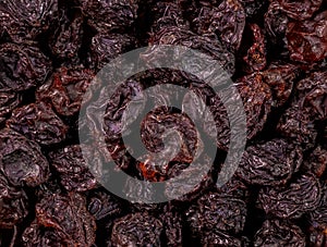 Heap of freeze dried blackcurrants isolated on white background. Top view