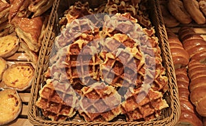 Heap of Fresh Baked Belgian Waffles in a Basket