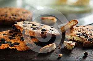 Heap of fresh baked cookies with raisin and chocolate