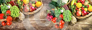 Heap of fresh, organic fruits and vegetables in wicker baskets on table