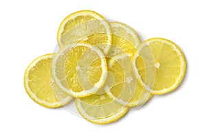 Heap of fresh raw juicy lemon slices close up on white background