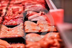 Heap of fresh raw meat food flesh background at shop supermarket