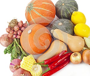 Heap of fresh vegetables isolated on white