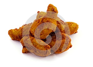 Heap of fried chicken isolated on white background.