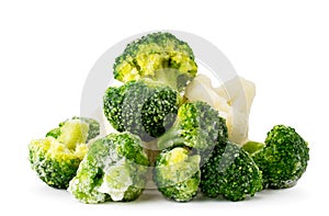 Heap of frozen broccoli and cauliflower close-up on a white. Isolated.