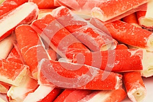 Heap of frozen crab stick, crabsticks, crab meat, crabmeat, surimi