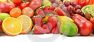 Heap fruit and vegetables  on white