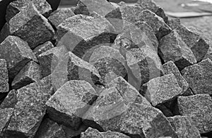 Heap of gray cobbles prepared on the construction site