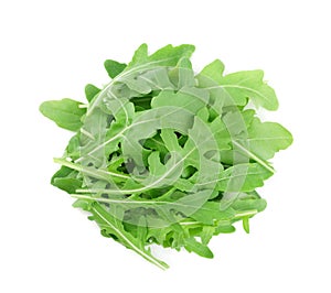 Heap of green rucola, rocket salad or arugula isolated on white background. Top view.