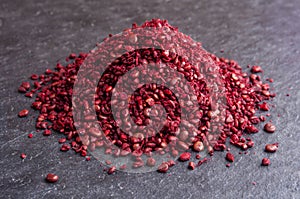 Heap ground sumach on stone background
