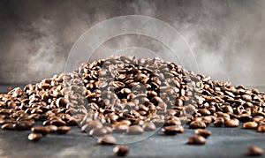 Heap of hot roasted coffee beans with steam