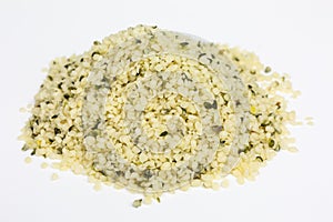 Heap of hulled hemp seeds