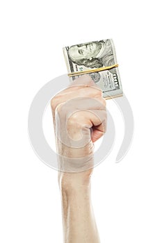 Heap of hundred dollar bills isolated on a white background