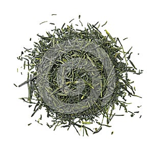 Heap of Japanese Gyokuro dried tea leaves close up on white background