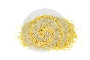 Heap of long parboiled rice isolated on white