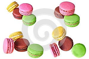 Heap of macaroons with different colors and varied taste, lemon, almond, chocolate, raspberry, strawberry and mint isolated