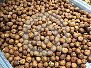 The heap of many peeled hazelnuts