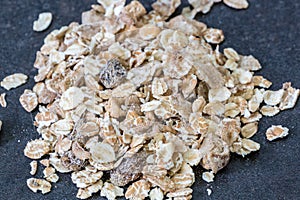 Heap of muesli isolated. Delicious granola cereal mix, with dried fruit and seeds.