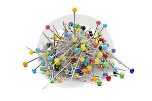 Heap of multi colored  sharp sewing pins