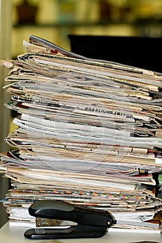 Heap of newspapers and magazines