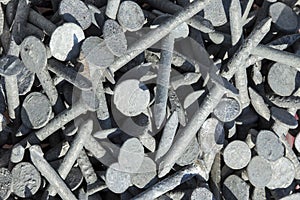 Galvanised steel nails background photo