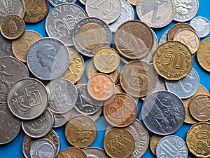 Heap of old and modern international coins. Concept of numismatics, coin collection, form of hobby