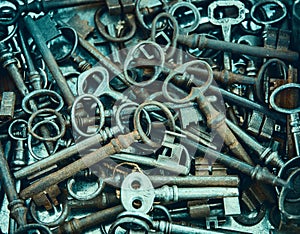 Heap of old, rusty lock key