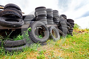 Heap of old used tires in pile