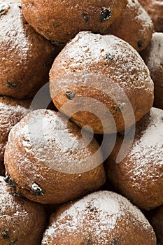 Heap of oliebollen,close up, traditional Dutch pastry for New Ye