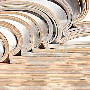 Heap of open magazines