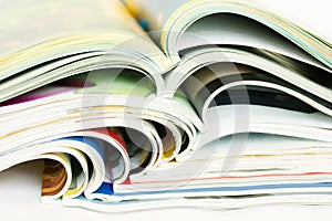 Heap of open magazines