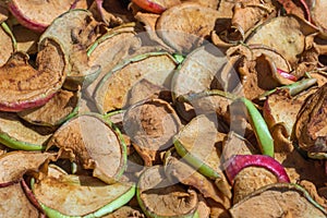 Heap of organic sun-dried apple slices. Healthy fruits