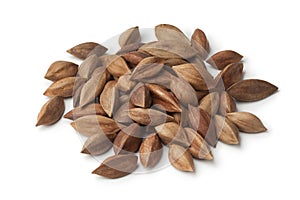 Heap of pili nuts on white background photo