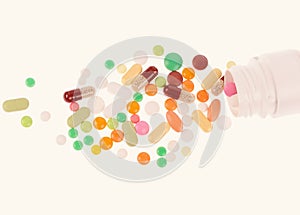 Heap of pills on the white background