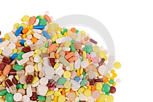 Heap of pills on white background