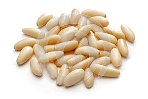 Heap of pine nuts isolated on white