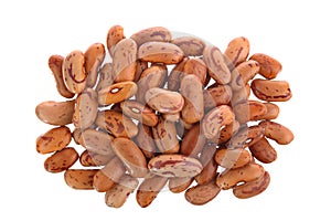 Heap of pinto beans isolated on white